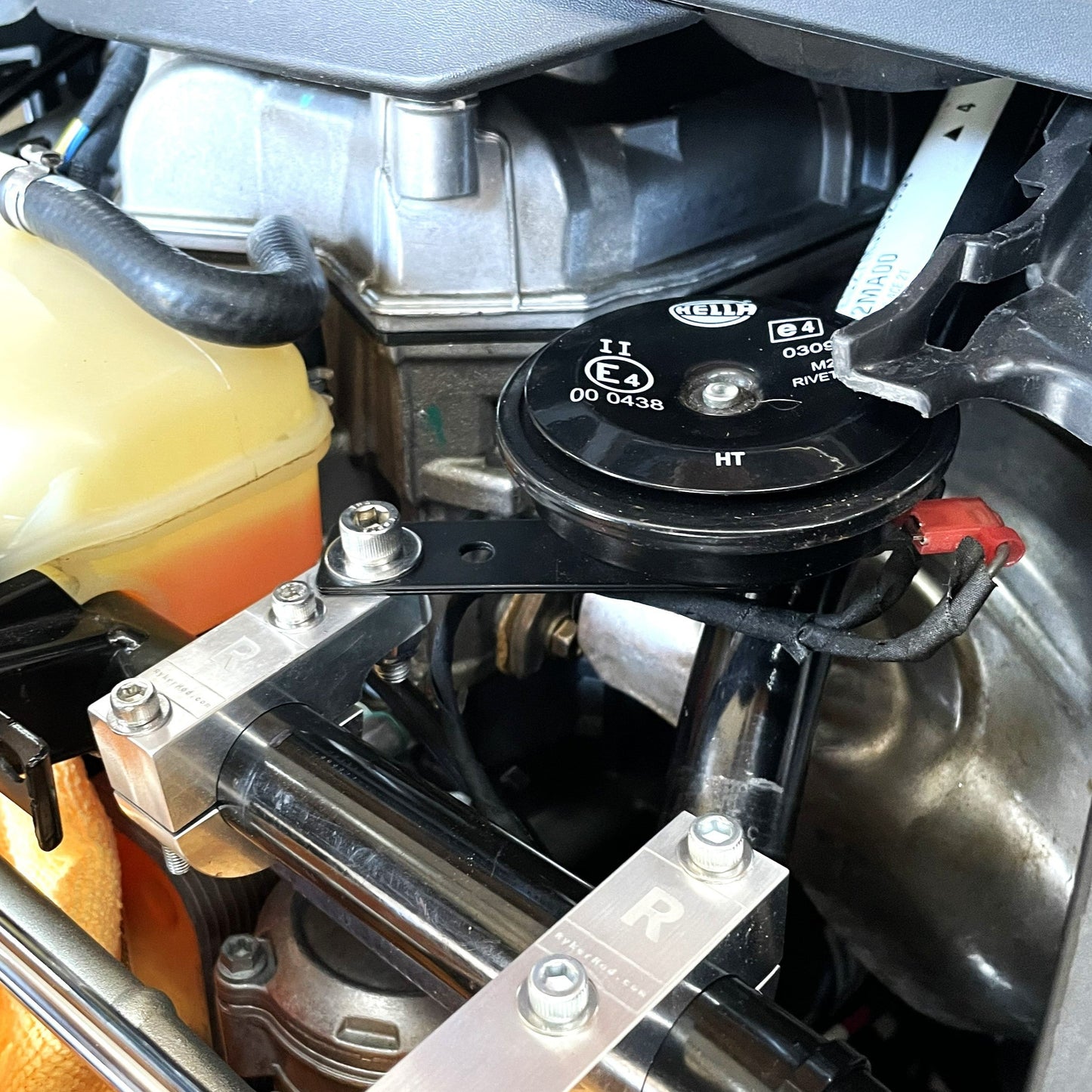 Horn Relocation Bracket