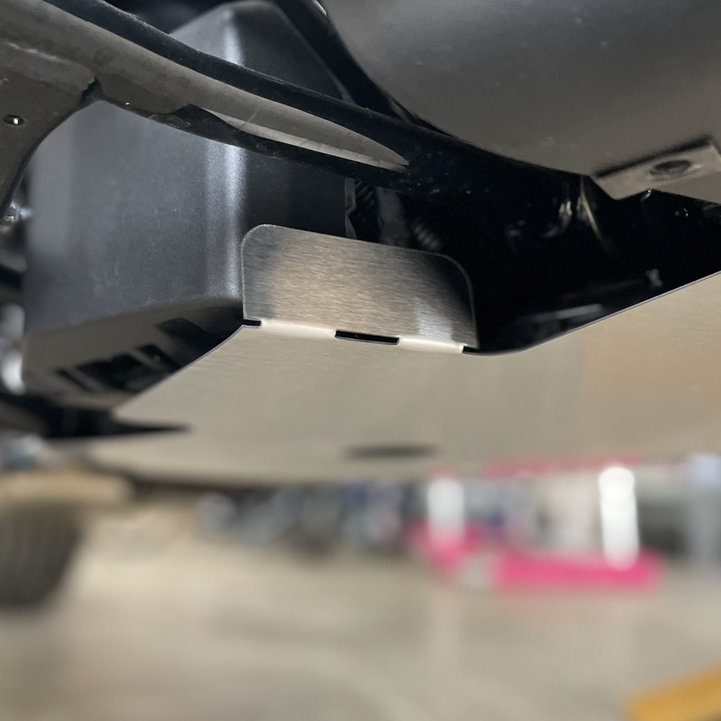 Engine guard with integrated VSS stone guard and Rectifier cooler channel.